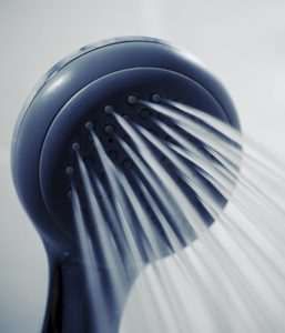 Water running from a shower head.